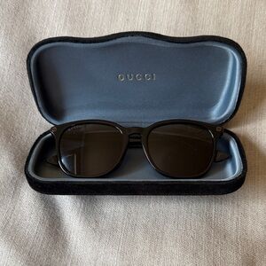 Gucci Dark Sunglasses with Elegant Case